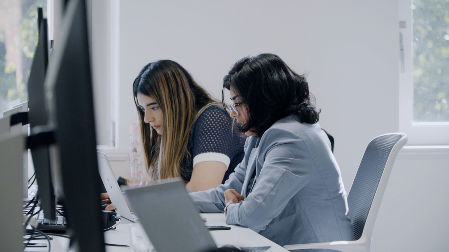Staff viewing computer