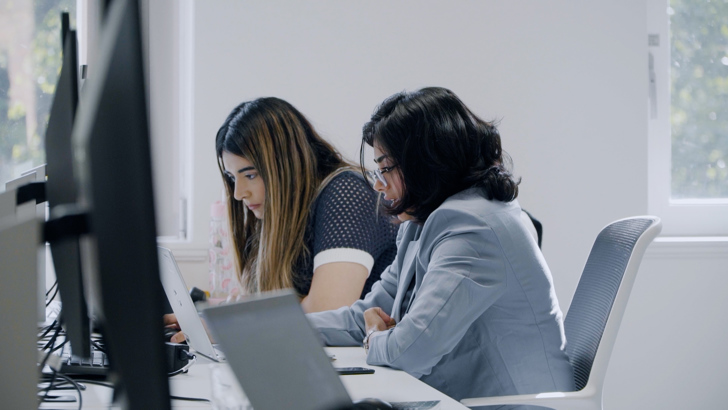 Staff viewing computer