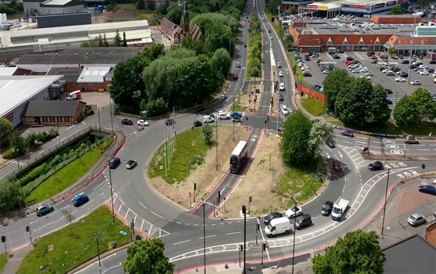 Urban roundabout in a local regeneration area demonstrating place-based infrastructure investment